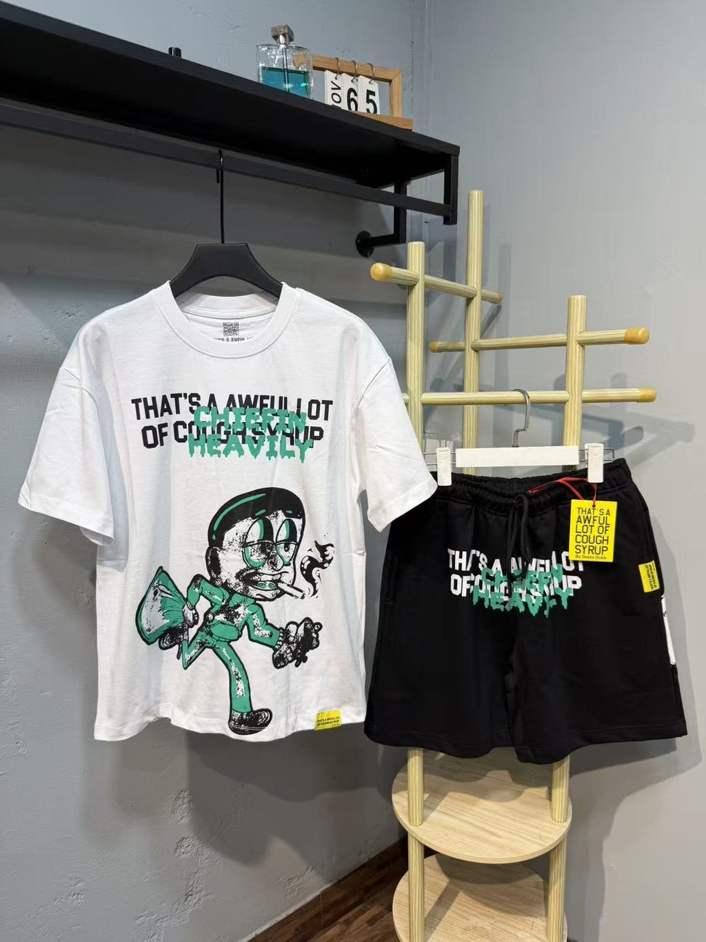 THAT'S A AWFUL LOT OF COUGH SYRUP Graphic Short-Sleeve Set — front