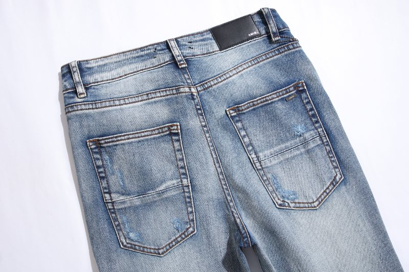 Amiri Light Blue Distressed Denim Jeans — detail